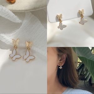 white and gold butterfly earrings